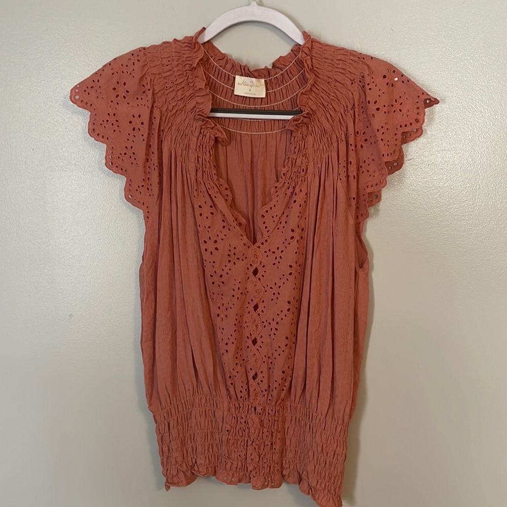 Fun and flirty coral top